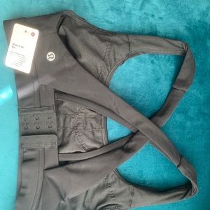 Lululemon sports bra “stash it all bra”.